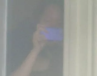 Pris de la fenêtre de l'hôtel photo belle femme nue